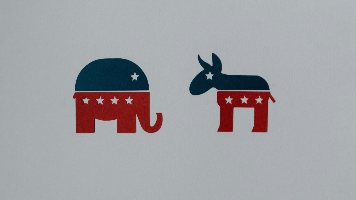 Why are Democrats represented by a donkey and Republicans by an elephant.