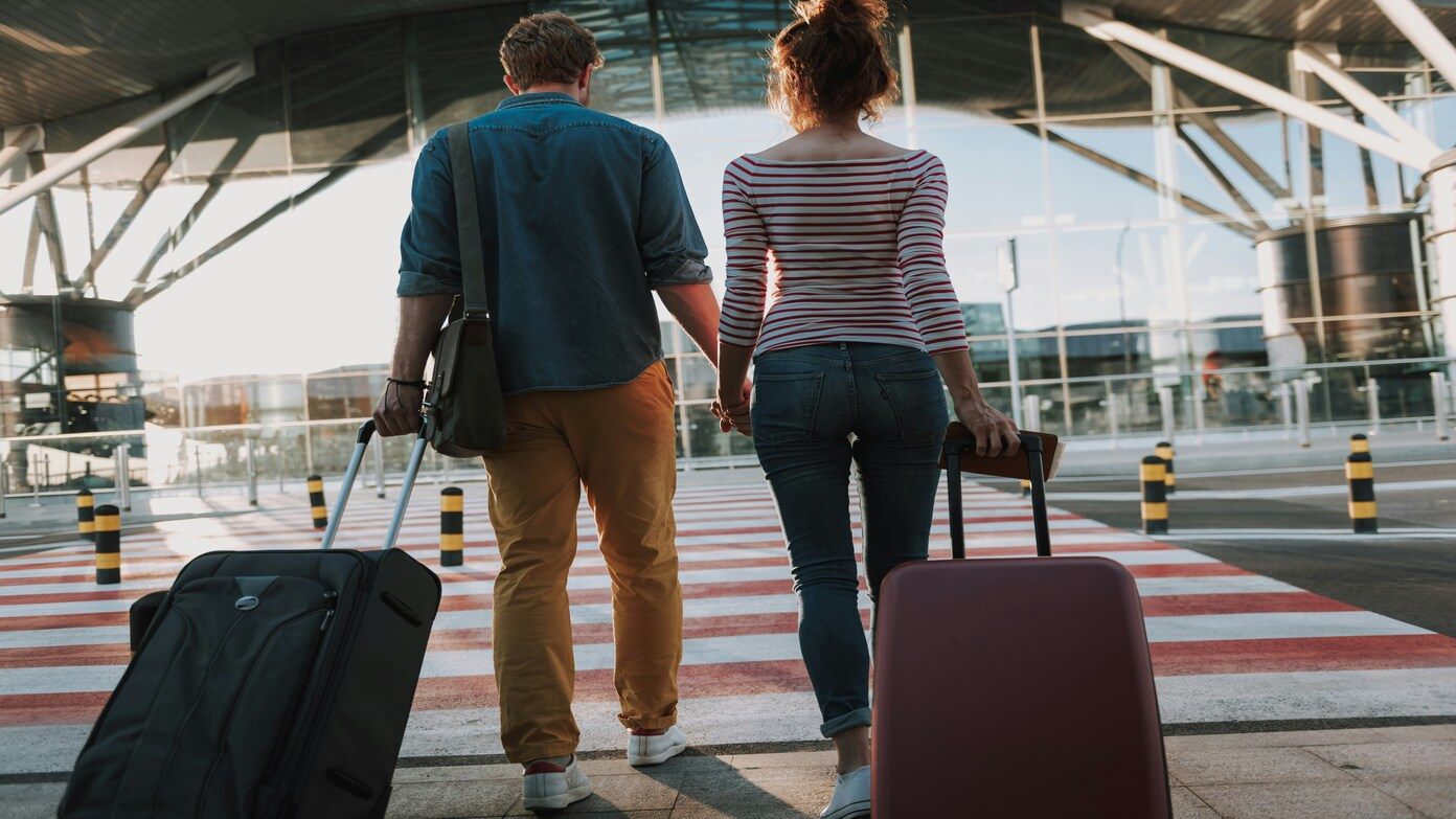 How much money can a husband and wife carry on an international flight legally?